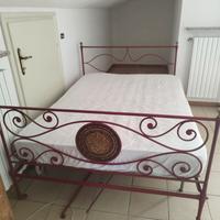 letto antico in ferro battuto