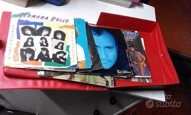 17 dischi 45 giri con copertine e custodia anni 70