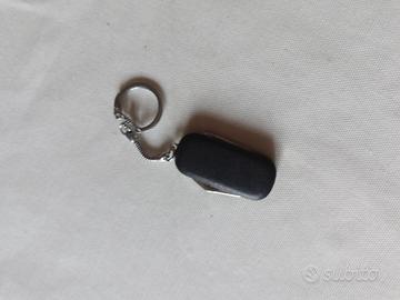 portachiavi apribottiglie e coltellino multiuso vi