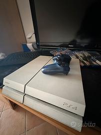 PS4 + giochi + pad + postazione
