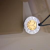 Ciondolo Rebecca segno in acciaio e oro