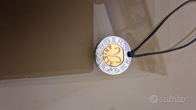 Ciondolo Rebecca segno in acciaio e oro