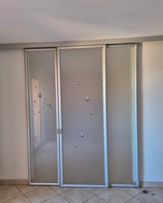 Porte scorrevoli a vetro