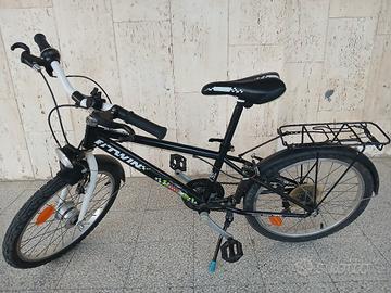 bicicletta city btwin ruote da 20 pollici .