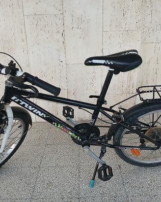 bicicletta city btwin ruote da 20 pollici .