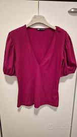 maglietta scollo a V e maniche a sbuffo taglia L