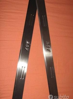 Battitacco porta PEUGEOT 207 in inox con logo