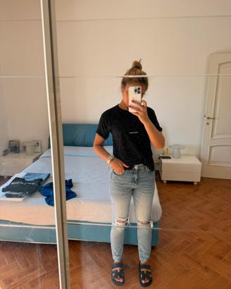 Jeans vita alta con strappi