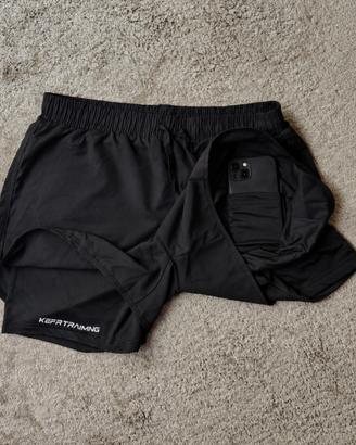 Pantaloncini da corsa con tasca portacellulare L