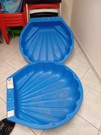 Sabbiera a forma di conchiglia