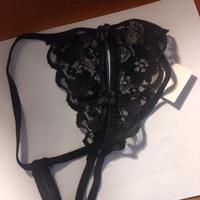 slip nero con aperture