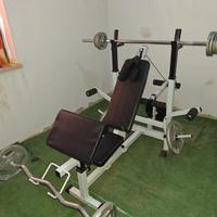 panca multifunzione con bilanciere manubri e pesi