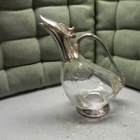 BOTTIGLIA CON DECORAZIONI IN SILVER