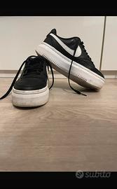 Scapre nike suola alta