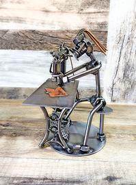 Scultura viti e bulloni SARTA stilista costumista