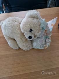 Orsacchiotto con stella fluorescente