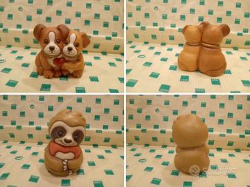 coppia cagnolini innamorati bradipo con cuore thun