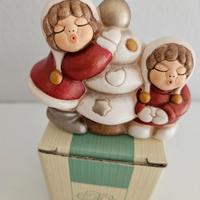 Bimbe sull albero di natale thun