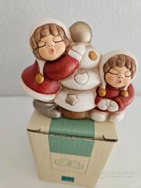 Bimbe sull albero di natale thun