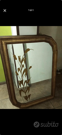 Specchio con decorazione