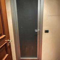 Porta alluminio e vetro da interno