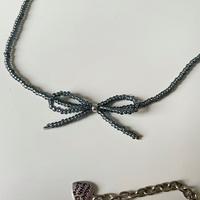 Collana di perle con fiocco