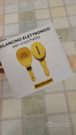 Bilancia pesa crocchette per cani e gatti