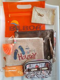 Set di borsellini toni aranciati, beige, rame