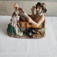 statuina ceramica vecchio al bagno