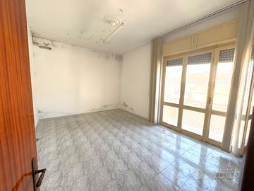 Ampio appartamento con balconi e soffitta