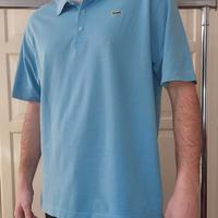 Polo Lacoste azzurra in cotone piqué L