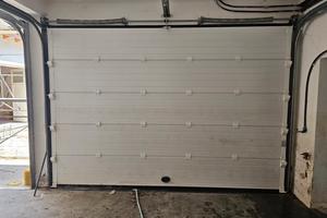 Portone elettrico per box