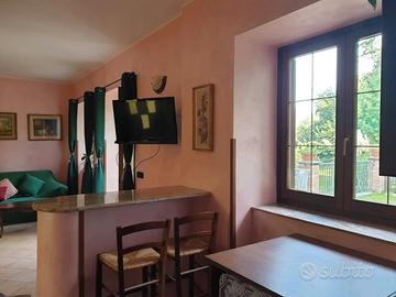 Monolocale con Posto Auto e Giardino Privato