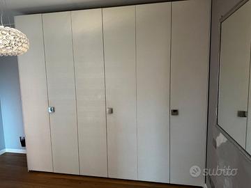 ARMADIO X VESTITI 6 ANTE SIMILPELLE +CASSETTIERA
