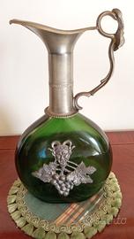 Brocca anni '60 con Bacco in peltro e vetro.