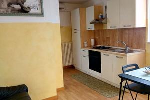 Monolocale in attico con parquet