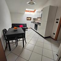 Trilocale mansardato con posto auto privato