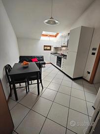 Trilocale mansardato con posto auto privato