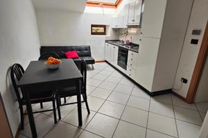 Trilocale mansardato con posto auto privato