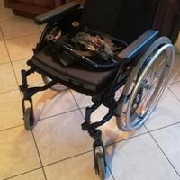 Carozzina pieghevole per disabili