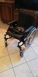 Carozzina pieghevole per disabili