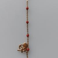 Braccialetto in oro giallo 18K e  corallo rosso