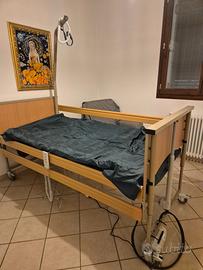 Letto motorizzato con barre contenimento