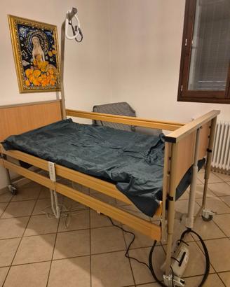 Letto motorizzato con barre contenimento