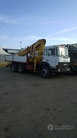 Iveco Magirus 330/30 con gru copma C 3630 N