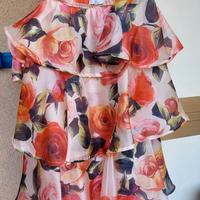 Vestito colorato a balze 