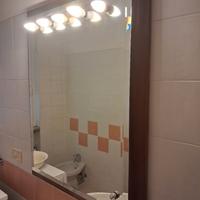 specchio con lampadine