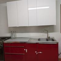 Cucina laccata + forno e piano di cottura in inox