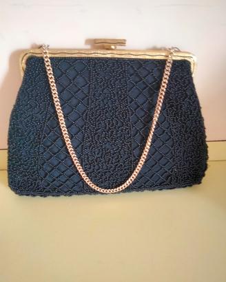 Pochette vintage nera e oro con perline