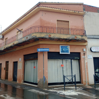 Casa e locale commerciale